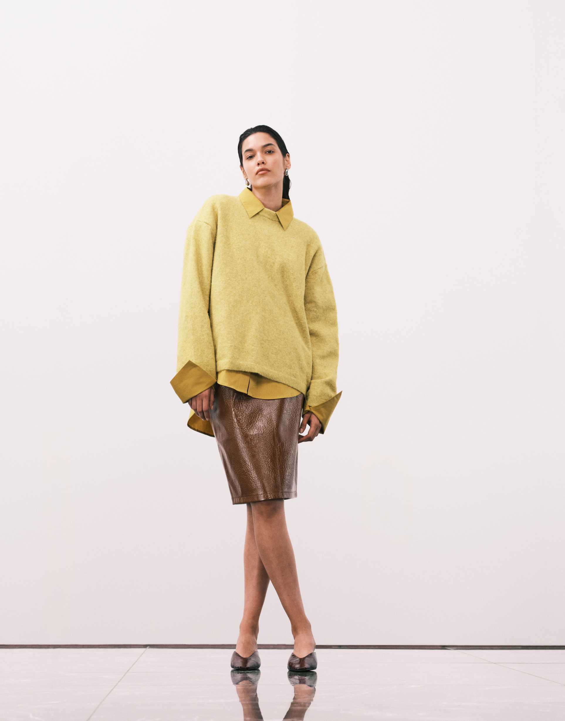 asos design faux leather clean 90s length midi skirt in camel