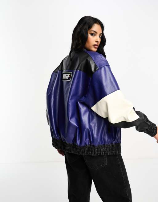 ASOS DESIGN oversized varsity bomber jacket in navy with mushroom faux  leather sleeves