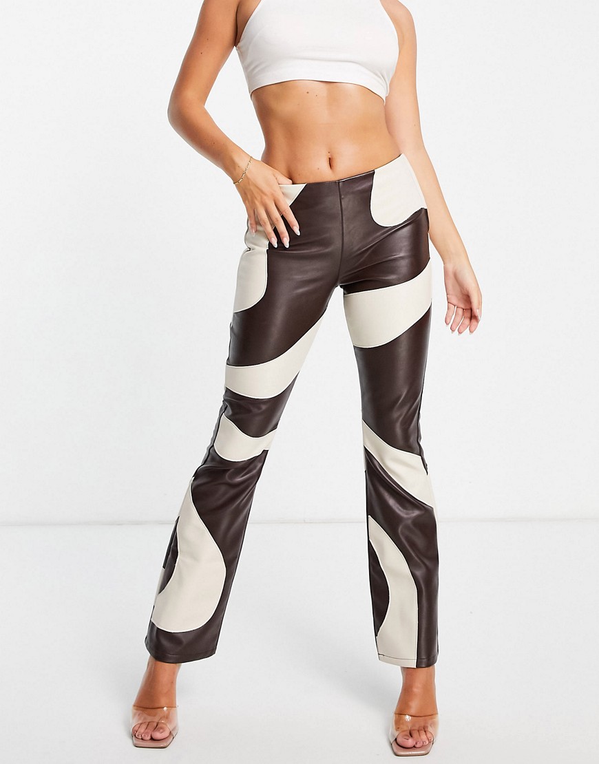 ASOS DESIGN faux leather contrast swirly flare pants in chocolate and cream-Brown