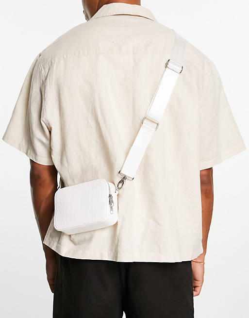ASOS DESIGN faux leather croc crossbody camera bag in off white