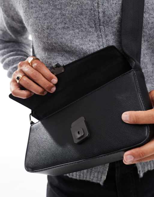 ASOS DESIGN faux leather cross body bag with clasp detail in black ASOS