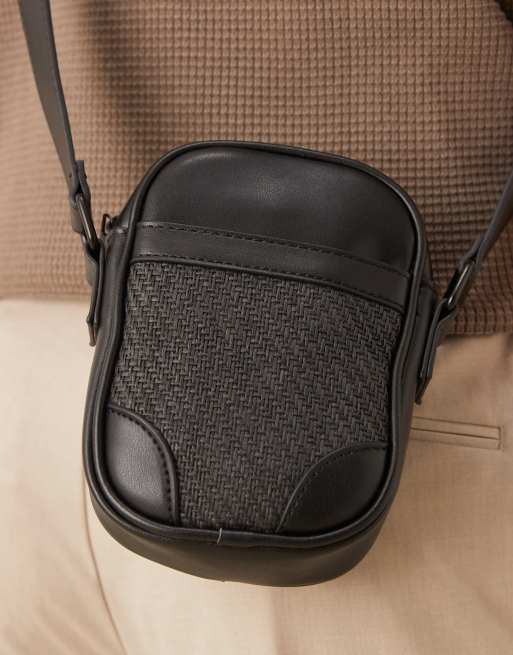 ASOS DESIGN faux leather cross body bag with rattan panel in black