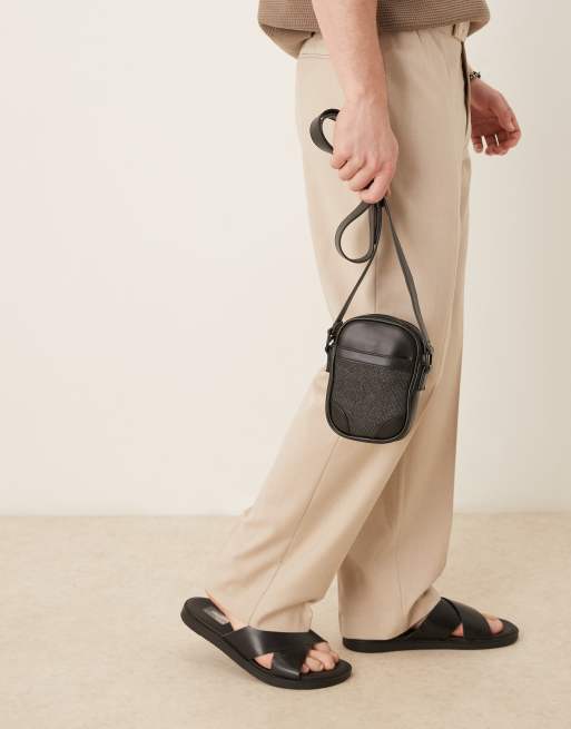 ASOS DESIGN faux leather cross body bag with rattan panel in black