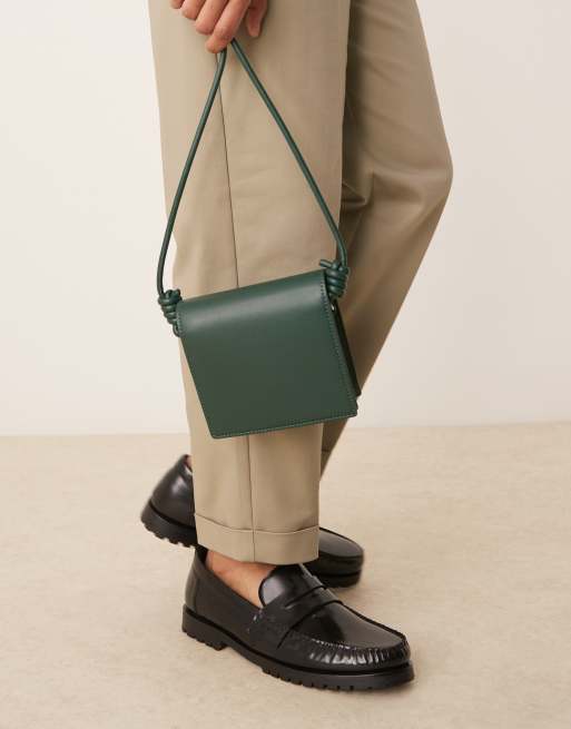 ASOS DESIGN faux leather cross body bag with strap detail in green
