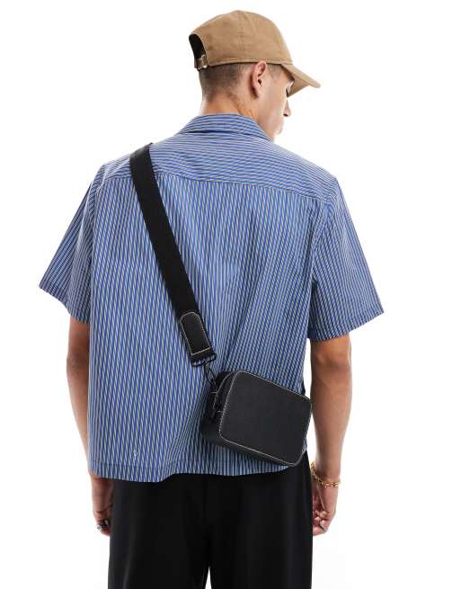 ASOS DESIGN faux leather cross body camera bag in black with contrast stitch, 2 of 4