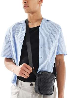 faux leather embossed cross body bag in black