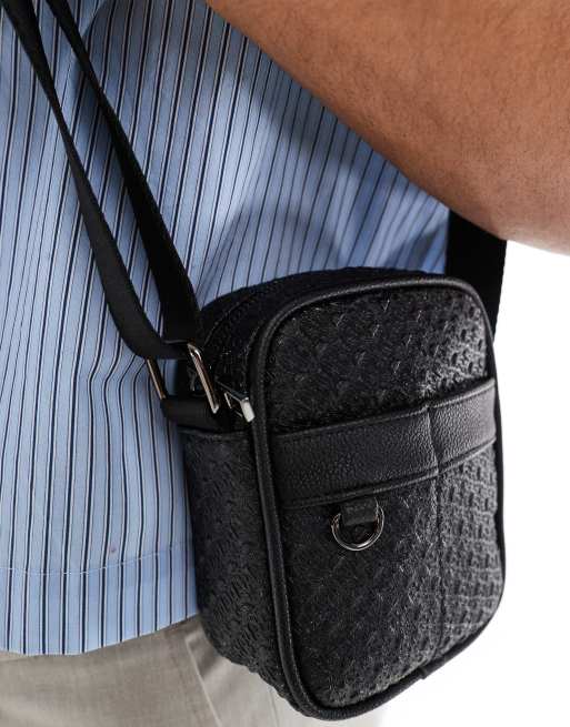 ASOS DESIGN faux leather embossed cross body bag in black