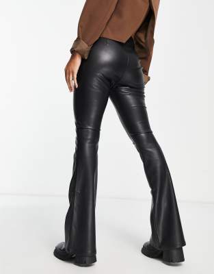 ASOS DESIGN low rise faux leather flared pants with lace-up waist in black