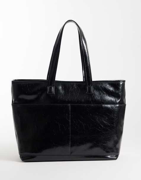 ASOS DESIGN faux leather multi pocket tote in black - view 1