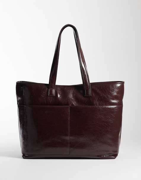 ASOS DESIGN faux leather multi pocket tote in burgundy - view 1
