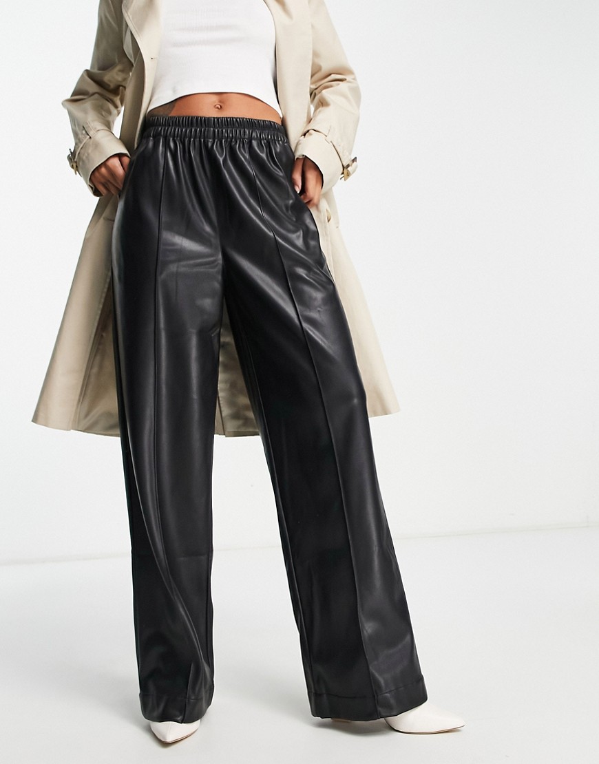 ASOS DESIGN faux leather oversized wide leg pants in black