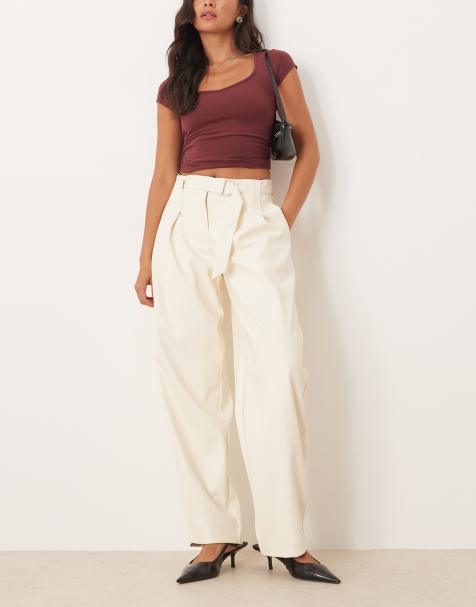 ASOS DESIGN faux leather pleated barrel leg pants with belt in bone - view 1