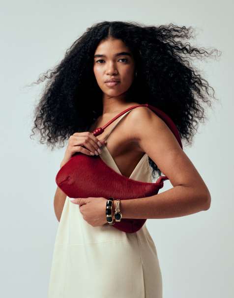 ASOS DESIGN faux leather pony affect shoulder bag in red - view 1