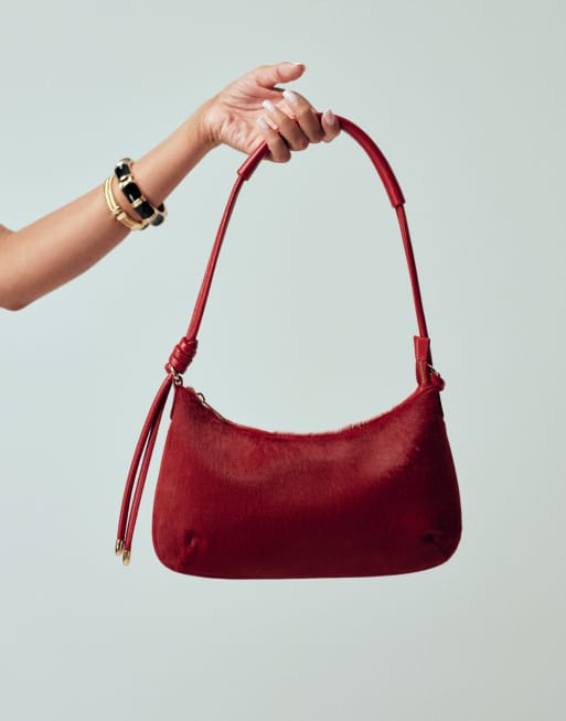 ASOS DESIGN faux leather pony affect shoulder bag in red, 2 of 3