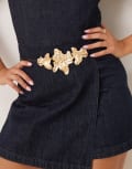 [ASOS DESIGN] ASOS DESIGN faux leather rope tie belt with abstract gold floral buckle in black S-M Black
