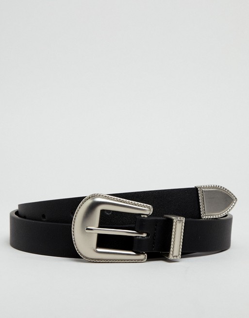 ASOS DESIGN faux leather skinny western belt in black with edge emboss ...