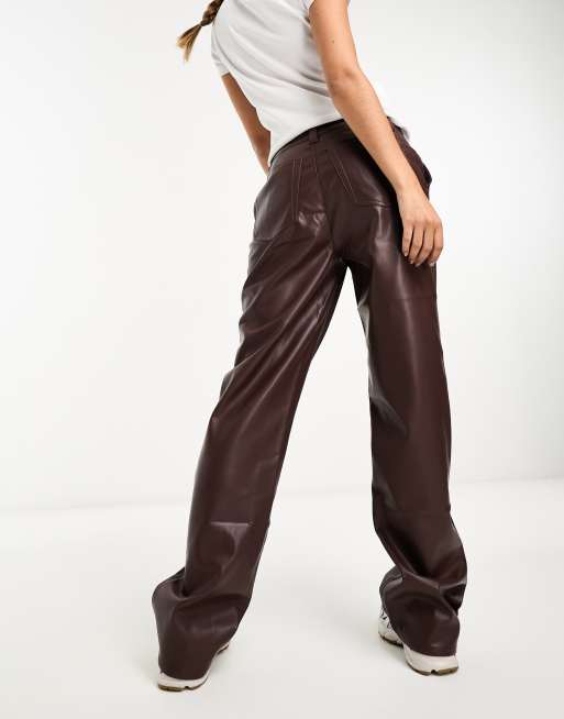 ASOS DESIGN Petite faux leather straight leg trousers in brown