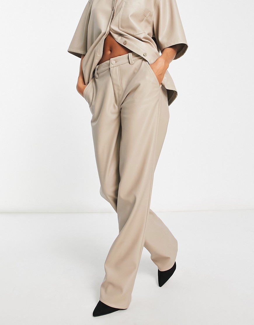 ASOS DESIGN faux leather straight leg trousers in putty-Neutral