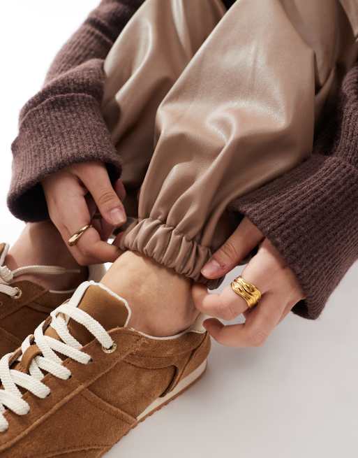 ASOS DESIGN faux leather sweatpants in mink