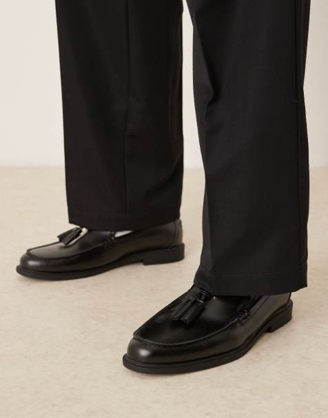 ASOS DESIGN faux leather tassel loafers in black - view 1