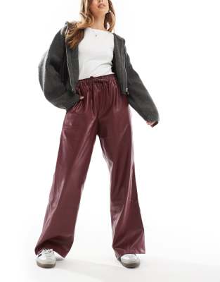 faux leather wide leg pull on pants in burgundy-Red