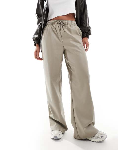 ASOS DESIGN faux leather wide leg pull on trousers in stone - view 1