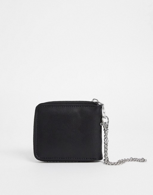 ASOS DESIGN zip around wallet in black faux leather with chain