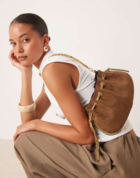  ASOS DESIGN faux suede shoulder bag with adjustable crossbody strap in contrast snake strap in brown - view 1