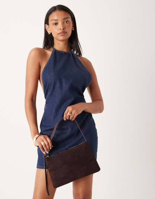 ASOS DESIGN faux suede shoulder bag with side buckle strap in plum