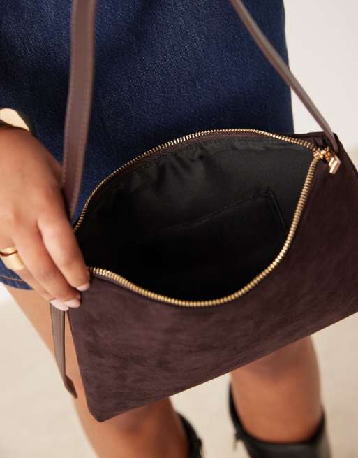 ASOS DESIGN faux suede shoulder bag with side buckle strap in plum