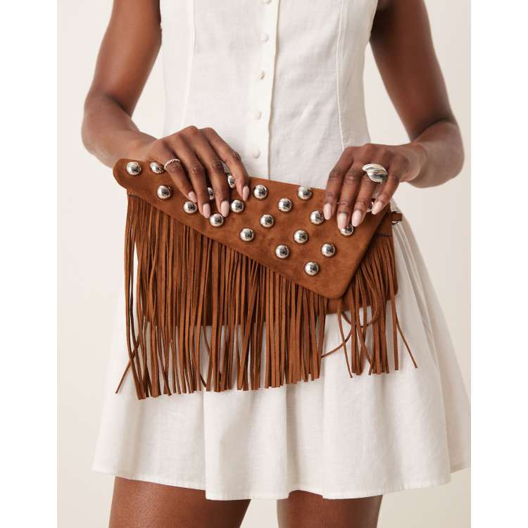 asos mini suede backpack with tassels Sandy Bay ASOS DESIGN faux suede tassel