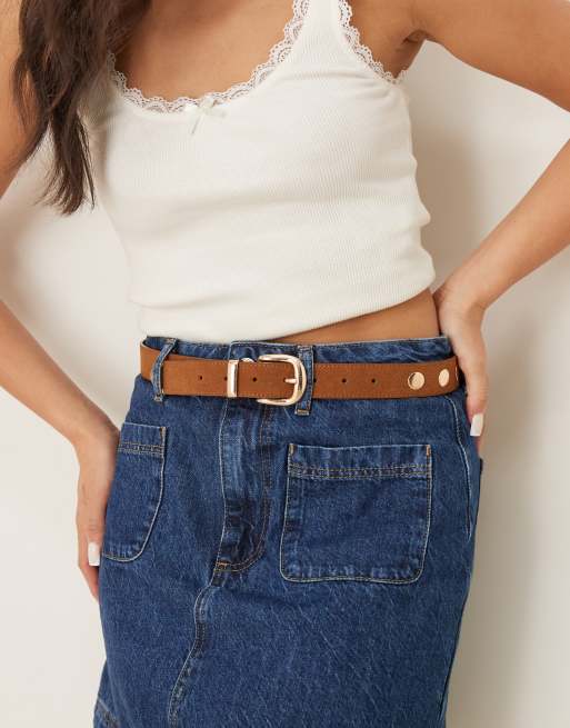 ASOS DESIGN faux suede waist and hip jeans belt with studding and tip detail in tan