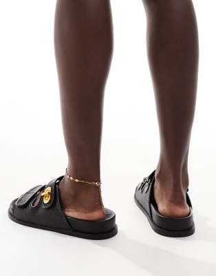 Asos Design Wide Fit Fawn Footbed Slides With Twist Lock In Black
