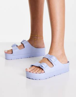 ASOS DESIGN - Fawn - Gel-Mules in Blau mit flacher Plateausohle