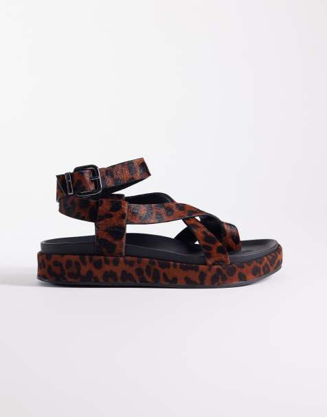 ASOS DESIGN Faye cross strap footbed sandal in hair on real leather with leopard print - view 1