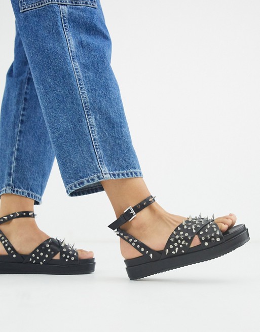 ASOS DESIGN Fearsome spike flat sandals in black