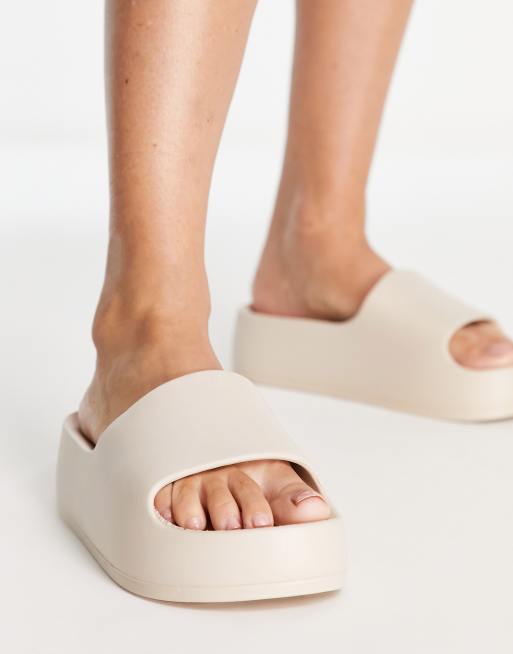 ASOS DESIGN February Platte slippers uit n stuk met plateauzool in stone