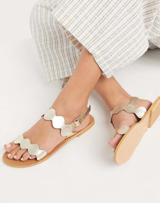 ASOS DESIGN Feedback leather flat sandals in gold