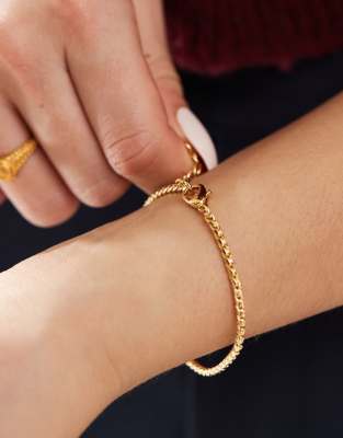 ASOS DESIGN - Feines Kettenarmband mit 14-Karat-Vergoldung-Goldfarben