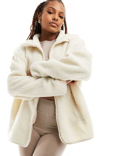 ASOS DESIGN - Felpa color crema in pile borg con zip