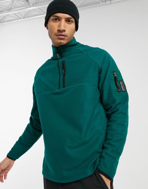 ASOS DESIGN - Felpa comoda in pile con zip corta e tasca MA1 con stemma