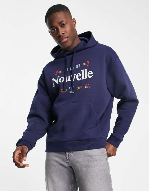 ASOS DESIGN - Felpa con cappuccio oversize con ricamo di città sul petto blu navy