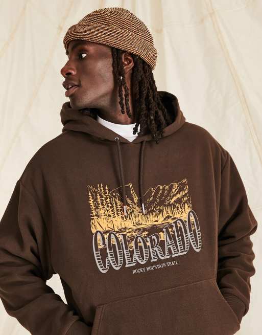 ASOS DESIGN - Felpa con cappuccio oversize in pile marrone con ricamo di montagna