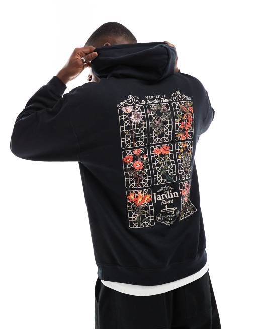ASOS DESIGN - Felpa con cappuccio oversize nera con stampa di fiori