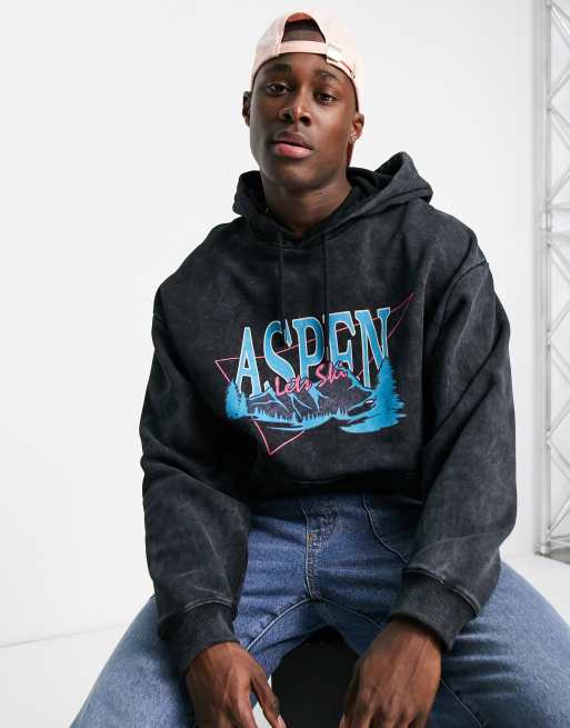 ASOS DESIGN - Felpa con cappuccio oversize nero slavato con stampa di città
