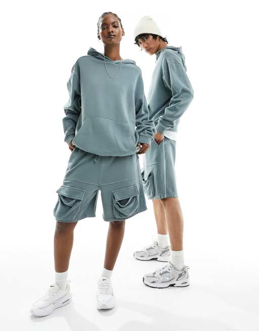 ASOS DESIGN - Felpa con cappuccio unisex oversize blu slavato con impunture in coordinato