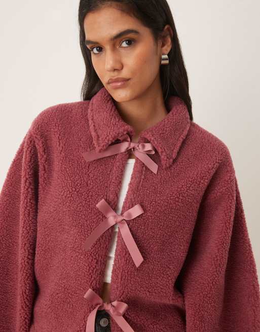 ASOS DESIGN - Felpa in pile borg rosa scuro con fiocchi sul davanti, 4 di 4