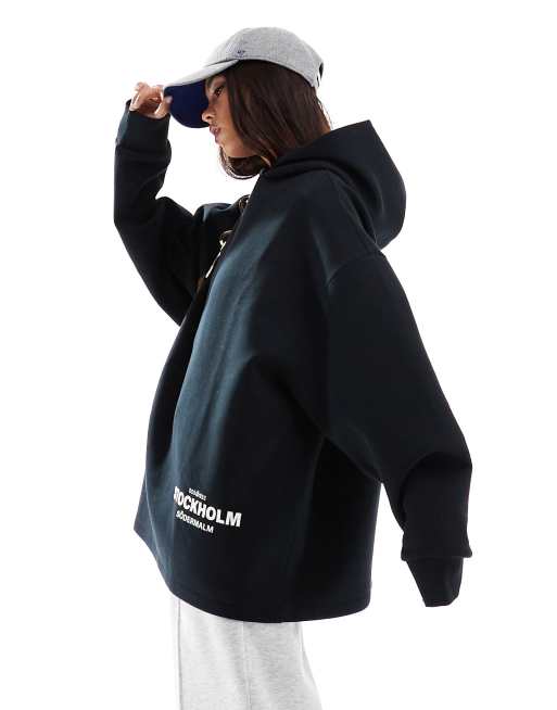 ASOS DESIGN - Felpa in tessuto scuba nero oversize con cappuccio e stampa “Stockholm”