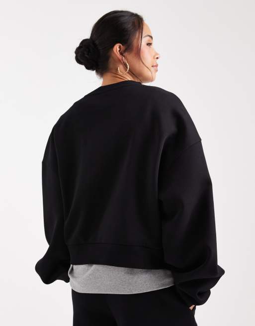 ASOS DESIGN - Felpa nera con maniche a palloncino e rovescio spazzolato, 3 di 4