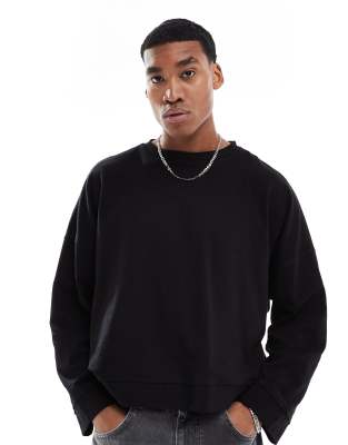 ASOS DESIGN - Felpa nera extra oversize squadrata con bordi grezzi